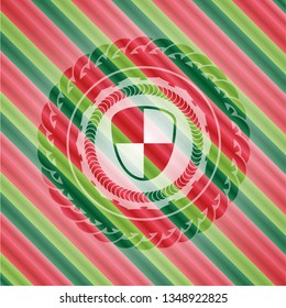shield, safety icon inside christmas colors style badge.