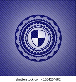 shield, safety icon inside emblem with jean texture