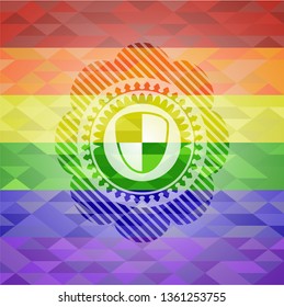 shield, safety icon inside emblem on mosaic background with the colors of the LGBT flag