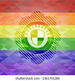 shield, safety icon inside emblem on mosaic background with the colors of the LGBT flag
