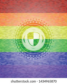shield, safety icon inside emblem on mosaic background with the colors of the LGBT flag
