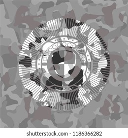 shield, safety icon inside grey camouflage texture