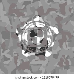 shield, safety icon inside grey camo emblem