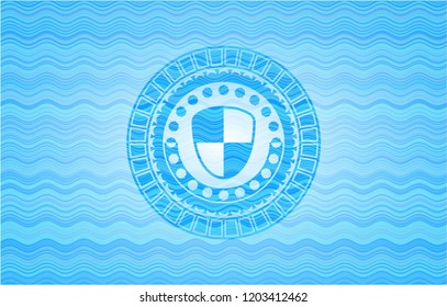 shield, safety icon inside light blue water style emblem.