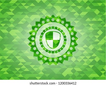 shield, safety icon inside realistic green mosaic emblem