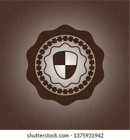 shield, safety icon inside realistic wood emblem