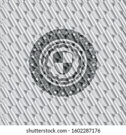 shield, safety icon inside silver color emblem. Scales pattern. Vector Illustration. Detailed.