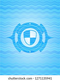 shield, safety icon inside water wave representation style badge.