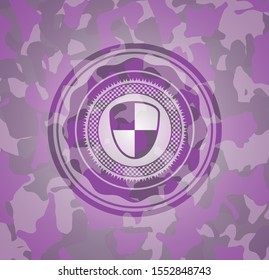 shield, safety icon on pink camouflaged texture