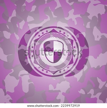 shield, safety icon on pink camo texture. 