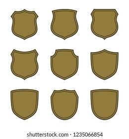 Shield shape bronze icons set. Simple flat logo on white background. Symbol of security, protection, safety. Element badge for protect design emblem decoration. Vector illustration