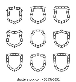 Shield shape icons set. Black silhouette signs isolated on white. Symbol protection, arms, coat honor, security, safety. Flat retro style design Element vintage heraldic emblem Vector illustration