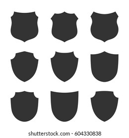 Shield shape icons set. Black label signs, isolated on white background. Symbol of protection, arms, security, safety. Flat retro style design. Element vintage heraldic emblem. Vector illustration