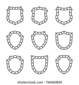 Shield shape icons set. Black silhouette signs isolated on white. Symbol protection, arms, coat honor, security, safety. Flat retro style design Element vintage heraldic emblem Vector illustration