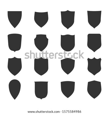 Shield shape icons set. Black label signs. Symbol of protection,