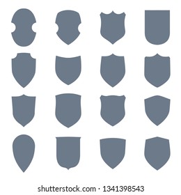 Shield shape icons set. Gray label signs isolated on white background. Symbol of protection, arms, security, safety. Flat retro style design. Element vintage heraldic emblem Vector illustration