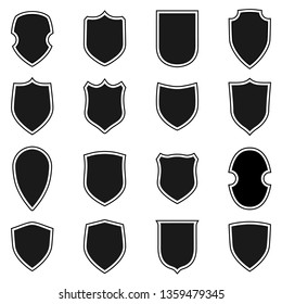 Shield shape icons set. Gray label signs isolated on white background. Symbol of protection, arms, security, safety. Flat retro style design. Element vintage heraldic emblem Vector illustration