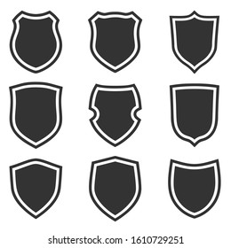 Shield shape icons set. Gray label signs. Symbol of protection