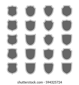 Shield shape icons set. Gray label signs isolated on white. Symbol of protection, arms, coat honor, security, safety. Flat retro style design. Element vintage heraldic emblem Vector illustration