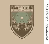 Shield shaped emblem of coffee cup in the wild