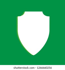 Shield sign illustration. Vector. White flat icon with yellow striped shadow at green background.