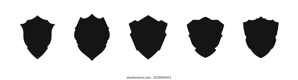 Shield silhouette vector icons. Silhouette icons of shields in different shapes