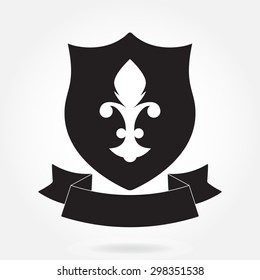Shield and stylish ribbon isolated on white background. Black shield with fleur-de-lis symbol. Heraldic royal design. Vector illustration.