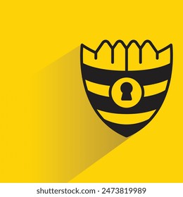 shield symbol with shadow on yellow background