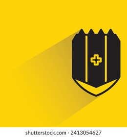 shield weapon icon with shadow on yellow background