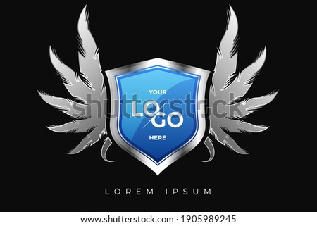 Shield and wing of the Cartoon Ranking Game. Medieval Shield. The shield for your emblem or logo can also be used in mobile or web games. the place for the logo mockup.