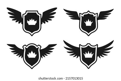 Shield wing crown emblem badge black glyph set. Elegant military emblem protection security. Award high quality dynasty coat arms stamp gothic guarantee. Heraldry retro banner medieval isolated