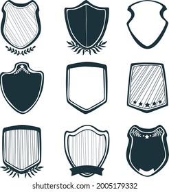 Shields for design and decoration set. Monochrome shields clip-art. Hand drawn doodle shields set.