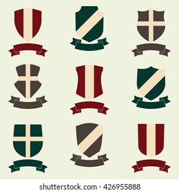 Shields with ribbon icon set. Different shield shapes collection. Heraldic royal design. Colorful vector illustration.