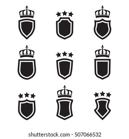 Shields set. Collection of different shield shapes with crown and stars. Heraldic royal design in flat style. Vector illustration.