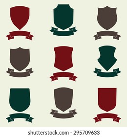 Shields and stylish ribbon set. Different shield shapes collection. Heraldic royal design. Colorful vector illustration.