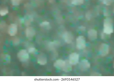 A shimmering background of light green glitter evokes a sense of magic and celebration. EPS vector illustration