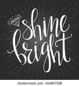 "Shine bright". Modern lettering on the black background