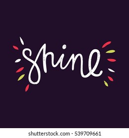 Shine. Bright multi-colored letters on dark background. Modern, stylish hand drawn lettering. Quote. Hand-painted inscription. Motivational calligraphy poster, typography. Greeting card for Christmas.