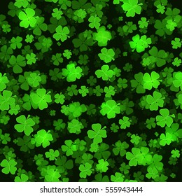 Shine Shamrocks on black background Seamless. Vector