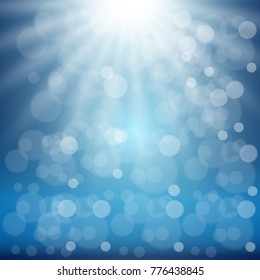 Shining abstract blue background with sun rays, bubbles and bokeh. Vector illustration.