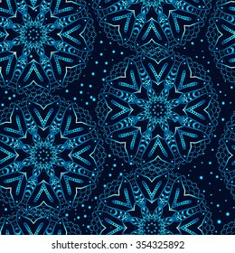 Shining beautiful snowflakes. Seamless winter pattern