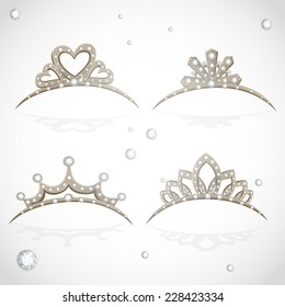 Shining gold  tiaras with diamonds isolated on a white background