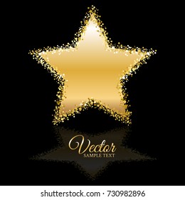 Shining golden star on a black background