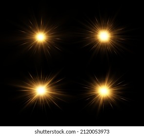 Shining golden stars isolated on black background. The star burst with brilliance. Glow effect.