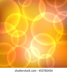 Shining orange background with light effects. Magic defocused glitter sparkles. Blurred soft backdrop. Vector illustration. EPS10