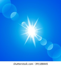 Shining sun at clear blue sky with copy space