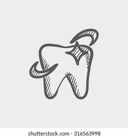 Shining tooth sketch icon for web, mobile and infographics. Hand drawn vector dark grey icon isolated on light grey background.