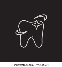 Shining tooth vector sketch icon isolated on background. Hand drawn Shining tooth icon. Shining tooth sketch icon for infographic, website or app.