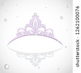 Shining violet tiara with diamonds on a white background