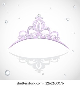 Shining violet tiara with diamonds on a white background